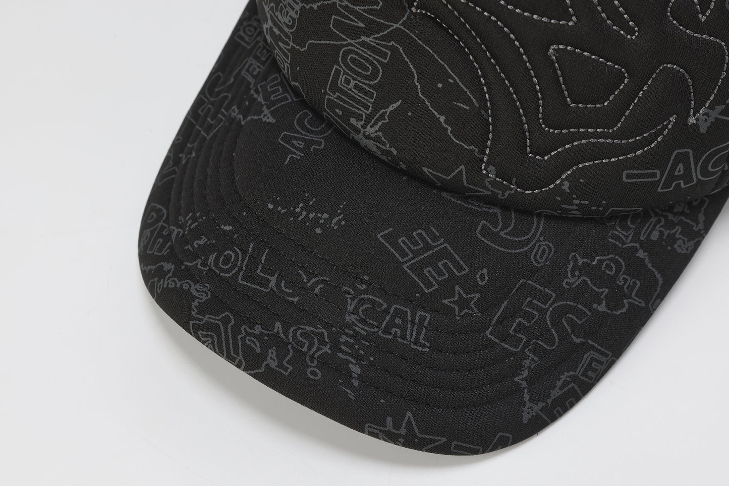 GRAFFITI CIPHER EMBROIDERED TRUCKER CAP