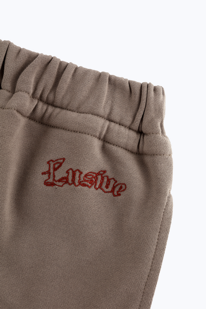 LOOSE FIT COTTON TERRY PATCH SHORTS BROWN